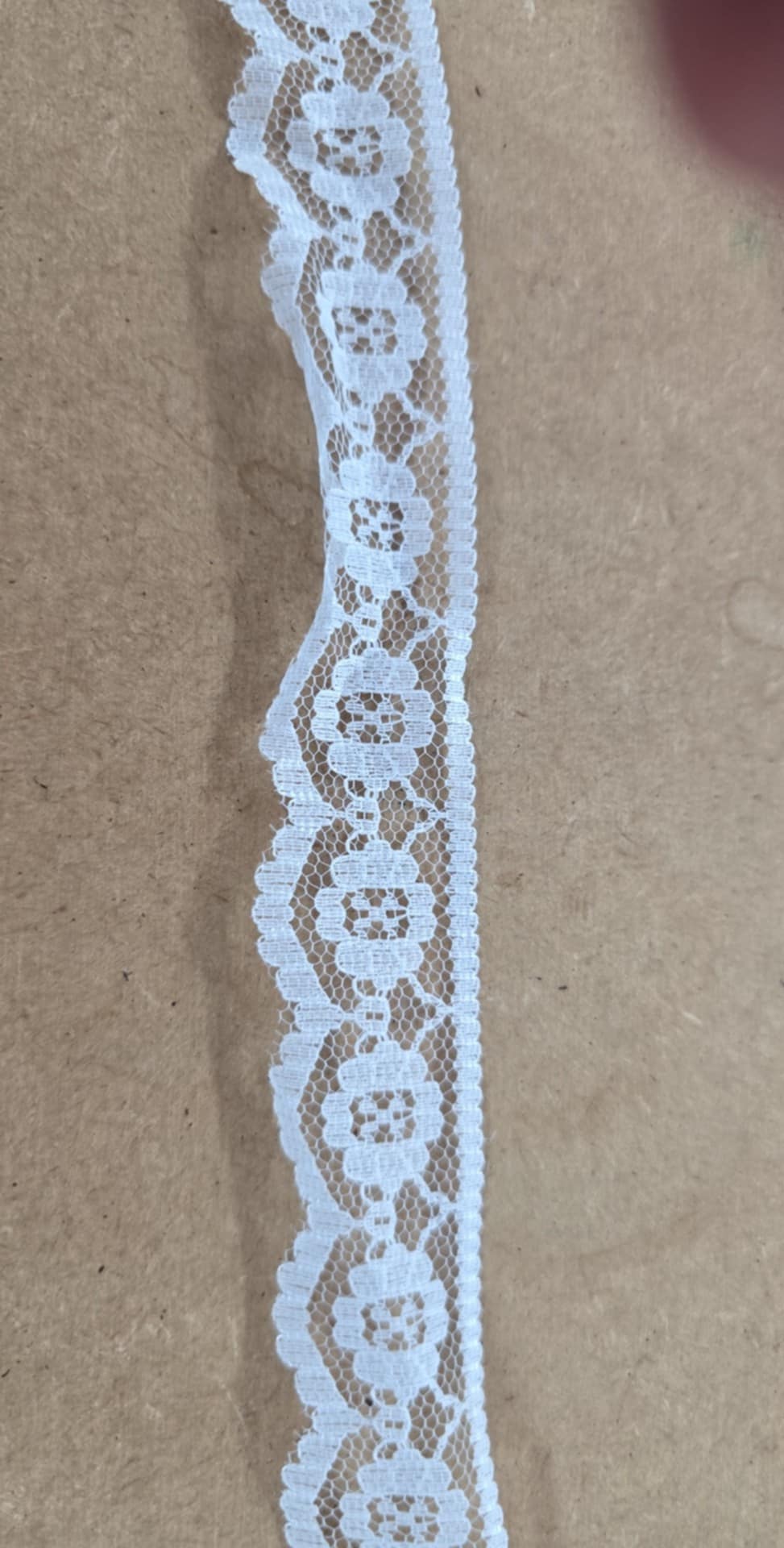 Lace and broderie trim