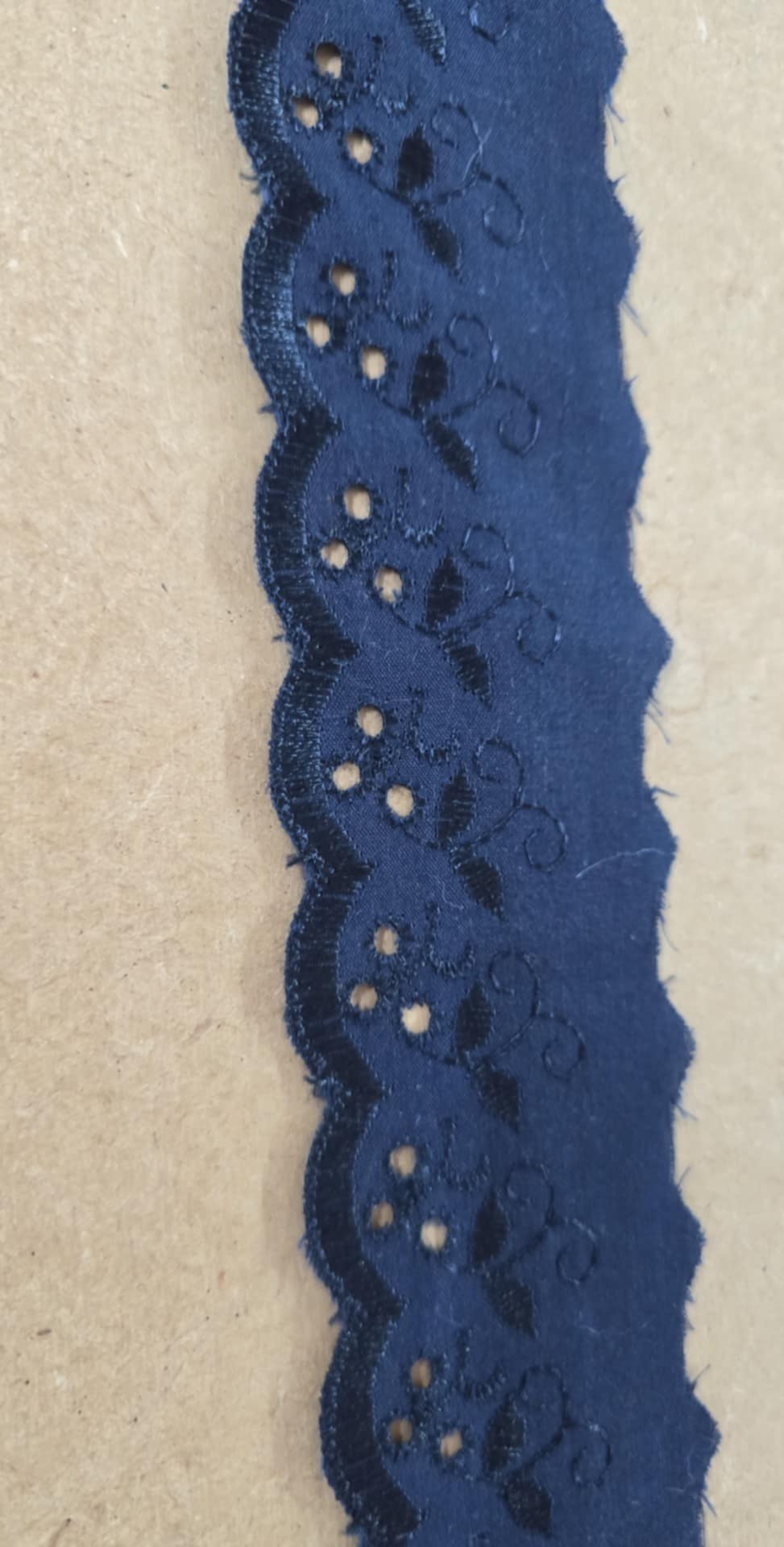 Lace and broderie trim