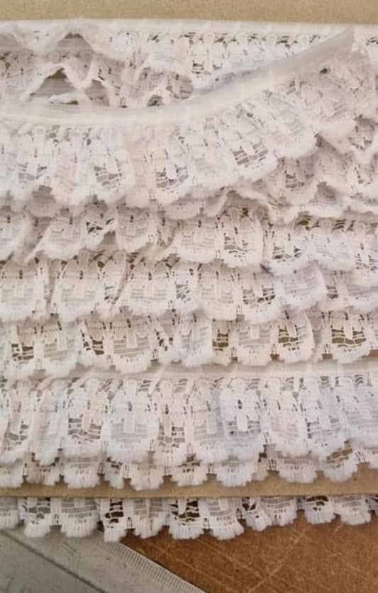 Lace and broderie trim