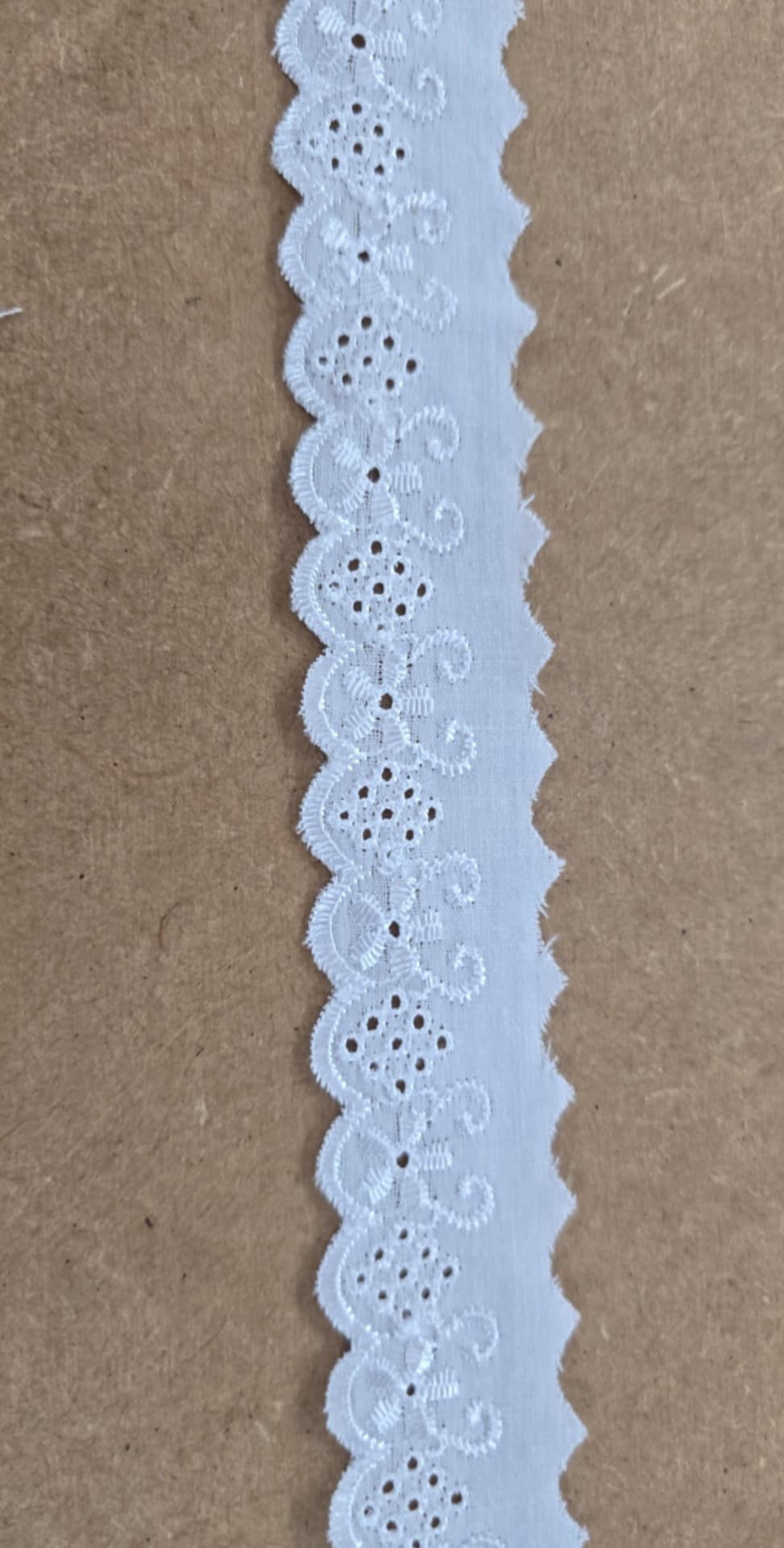 Lace and broderie trim