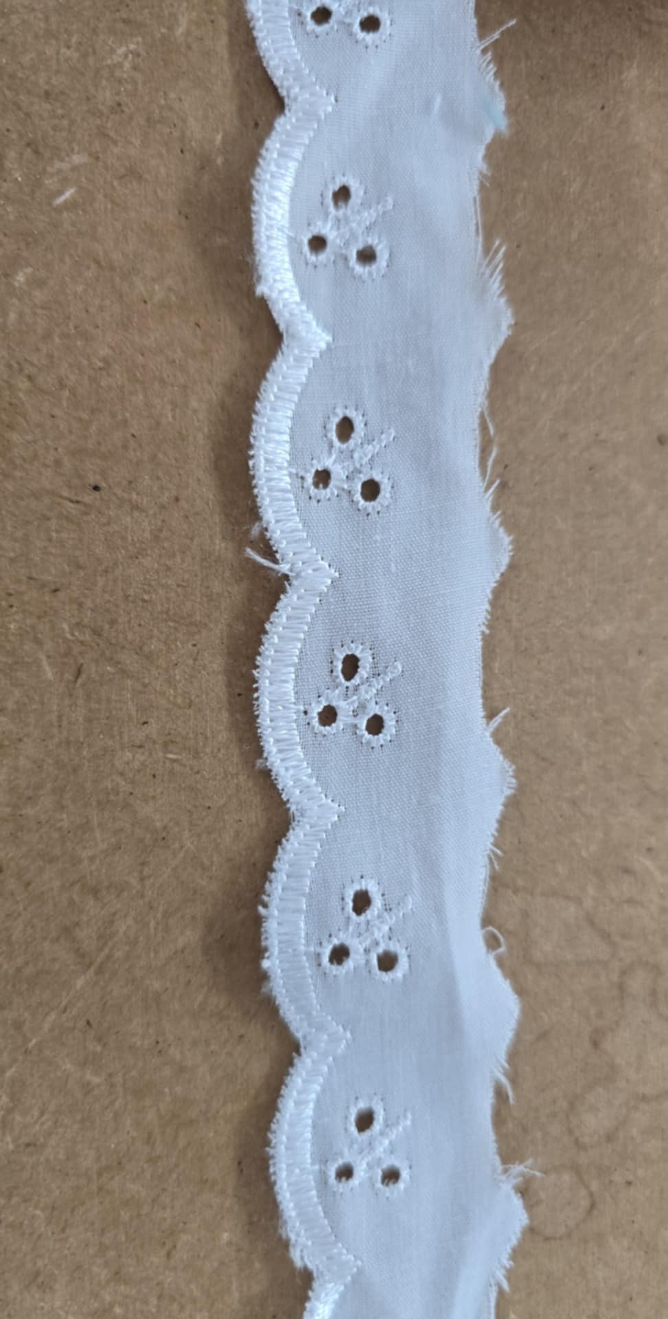Lace and broderie trim